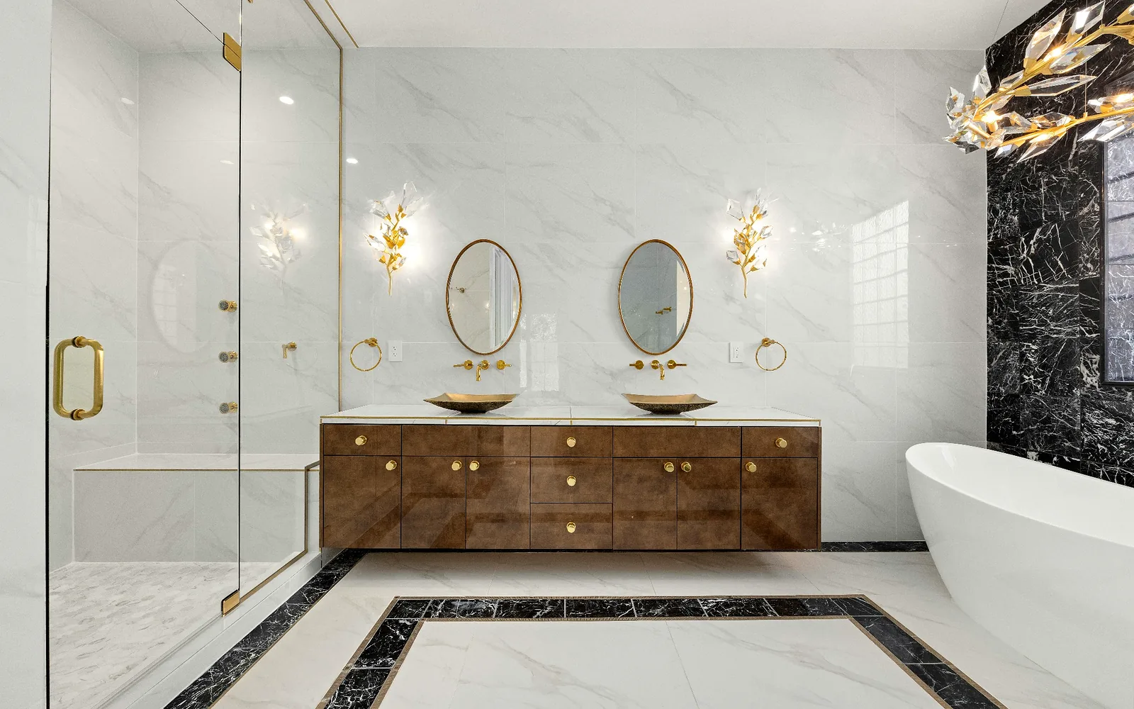 Switchable privacy glass in a luxury residential master bathroom changing from clear to private