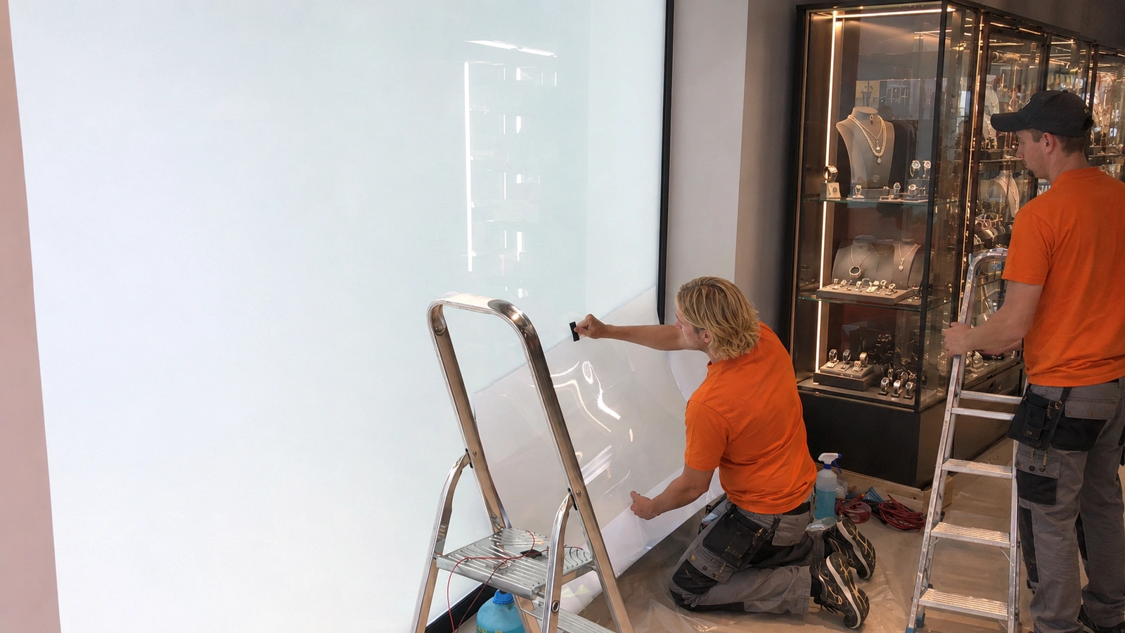 PDLC smart film retrofit installation on commercial glass in Atlanta